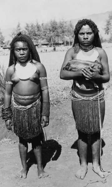 Two central New Guinea women wearing traditional bangles