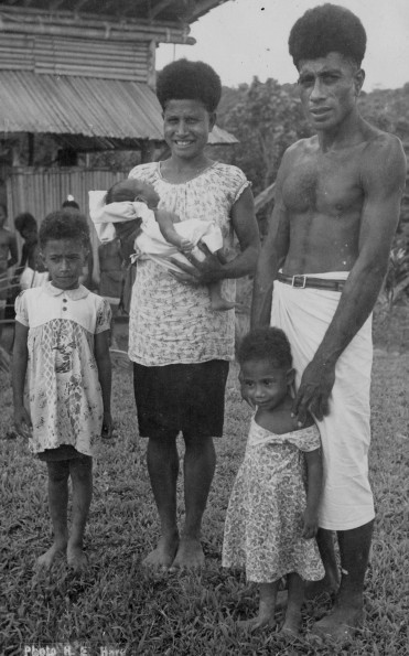 Fine native missionary family in New Guinea from Manus to the east, where USA had a huge naval base during the war in the Pacific.