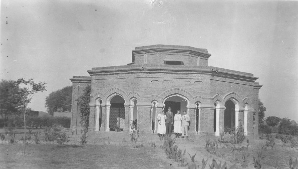 Leonard E. Allen, wife and child with Mr. and Mrs. Masters from Australia in front of the Allen home in Haspur, India