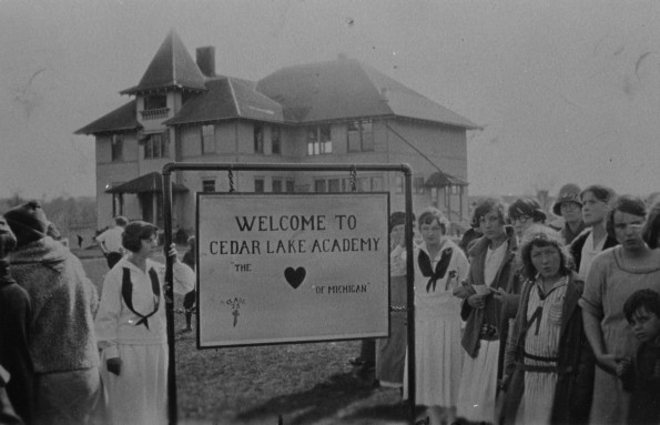 Cedar Lake Academy welcome sign, Administration Building, and students welcome you to campus, about 1925