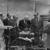 Loma Linda University President, V Norskov Olsen and some men tour a machinery shop, 1970s
