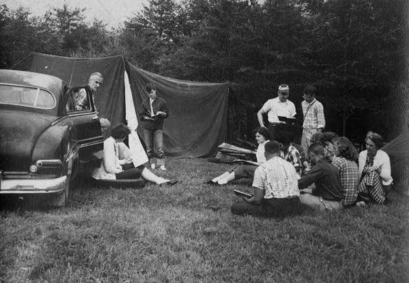 Madison College students at a worship service during a campout