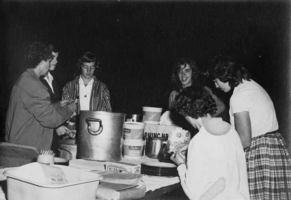 Madison College students preparing supper on a campout