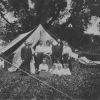 Family group outside their tent at the Michigan Conference camp meeting, about 1909