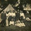 Family group outside their tent at the Michigan Conference camp meeting, about 1909