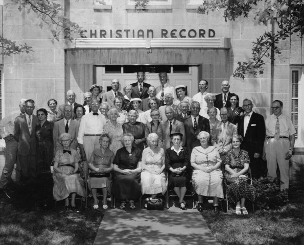 Christian Record Braille Foundation workers, about 1956 in front of their building in Lincoln, Nebraska