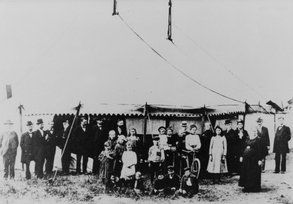 Group of people by a large tent at the organization of the British Columbia Conference, 1902