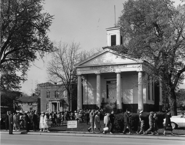 Village Seventh-day Adventist Church members walking from their old church home to the new building in the early 1960s (Berrien Springs, Mich.)