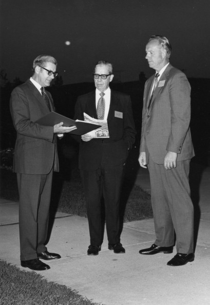 Fred Stephan, Walton Brown, and Clifford Jaqua discuss plans at the 1971 Teacher's Convention at Andrews University