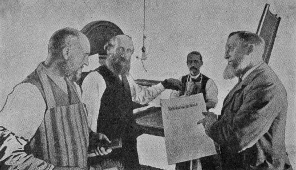Four printing press pioneers with the first printing press