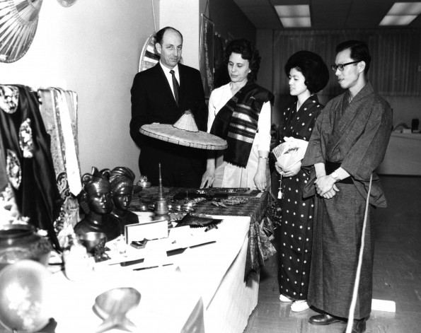 Two westerners and two natives at the Far Eastern Division table as part of the World Mission Exhibit at Andrews University Feb. 21 thru Mar. 1, 1967
