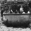 Unknown man in a mechanical litter carrier