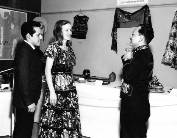 Mr. and Mrs. Jamie Cruz and Mr. Silva at the Inter-America table as part of the World Mission Exhibit at Andrews University Feb. 21 thru Mar. 1, 1967