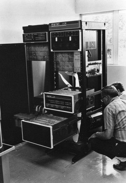 Walla Walla College teacher helps a student in electronics lab