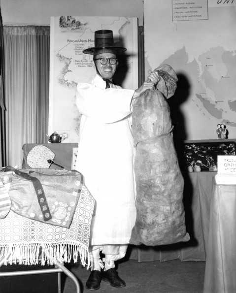 Man from Korea show objects from Korea as part of the World Mission Exhibit at Andrews University Feb. 21 thru Mar. 1, 1967