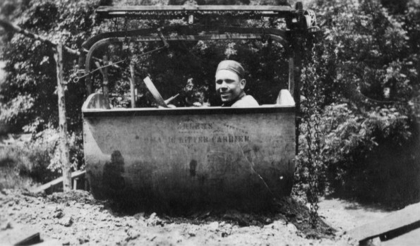 Unknown man in a mechanical litter carrier