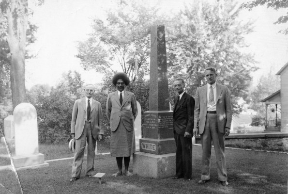 Four men at the White family gravesite