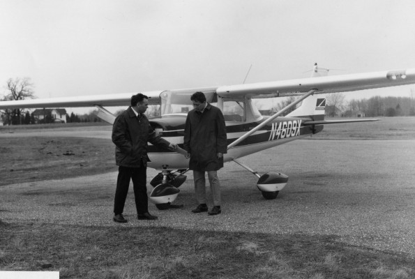 Wendell Cole shows Terry Cowell how to check the propeller before take off at Andrews University Airport