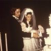 Marcia Joan Hammill and her husband cutting the wedding cake