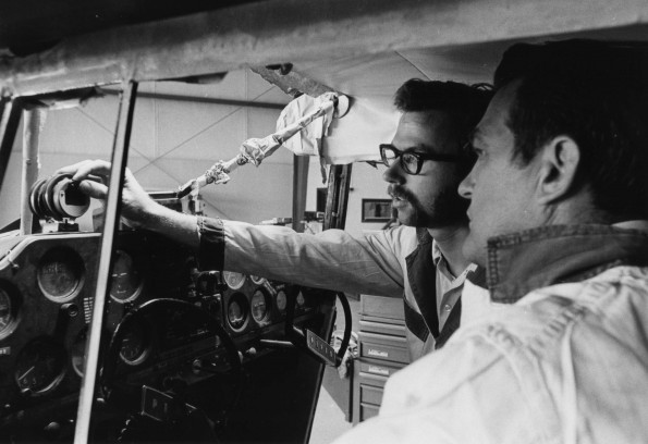 Andy Moore and Bill Chapman discuss a new compass being installed in a plane at the Andrews University Airport