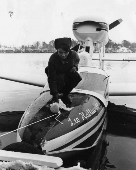 The Leo Halliwell amphibian plane was christened by Janis Joseph, secretary of the Andrews University student association