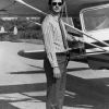 Andrews University flying student missionary Dan Wenberg in front of a plane