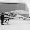 Wendell Cole stands beside the Cessna 140 teaching plane