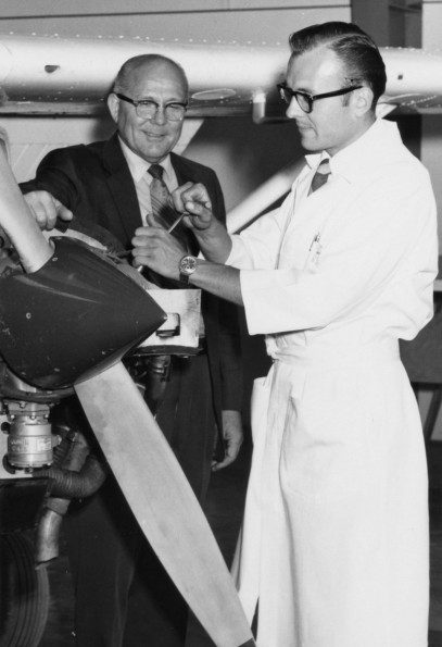 Vernon Edward Garber visited the Andrews University Airport aviation department while Alfred Fox was maintaing a plane engine