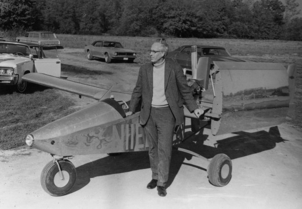 Edwin Buck, Andrews University alumus, and a plane which he designed and built