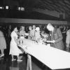 Refreshment table in Johnson Gymnasium prior to the Andrews University alumni Homecoming banquet, 1960