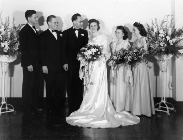 [Rudolph and Mary Reinhart with their groomsmen and bridesmaids]