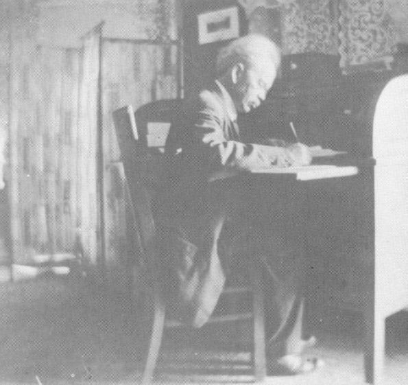 E. J. Waggoner at his desk