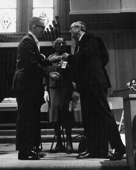 [Pastor Clarence Powers (?) receiving an award from Dr. Hammill during Andrews University's 1973 alumni homecoming]