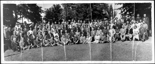 Group of unknown people posed outdoors