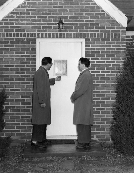 [Two young men at a home for ingathering]