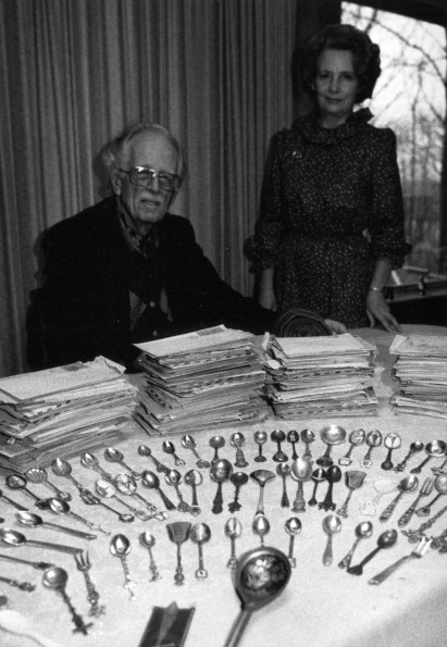 [Horace Shaw and Louise Dederen with items donated to the Andrews University Heritage Room]