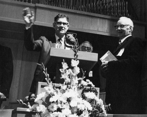 [Wilson Trickett waving farewell as AUAA president during Andrews University's 1973 alumni homecoming]