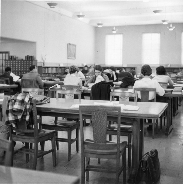 [Students studying in Emmanuel Missionary College library]