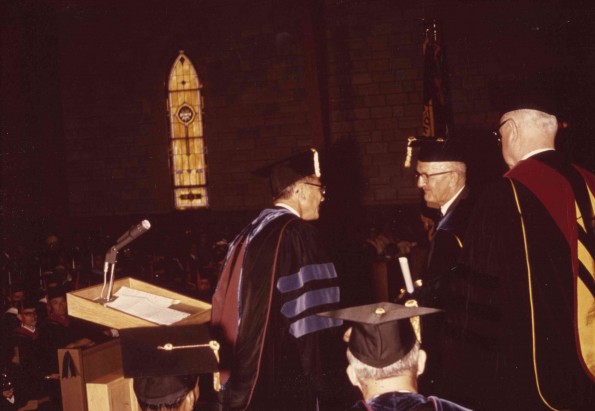 [Charles E. Wittschiebe receives the Citation of Excellence award from Andrews University upon his retirement]