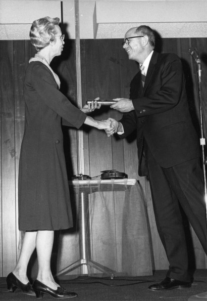 [Marjorie Hamp receives an award for 33 years of service to from Andrews University]