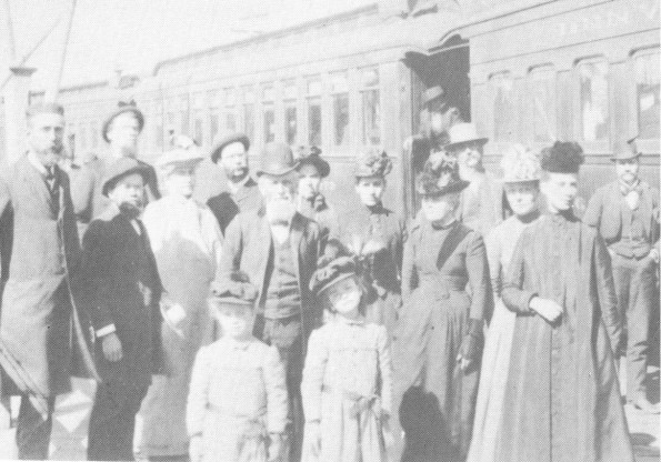 A group of workers leaving Oakland, California for the east include E. J. Waggoner and his family