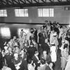 Andrews University alumni mingle and talk prior to the Homecoming banquet in Johnson Gymnasium, 1960