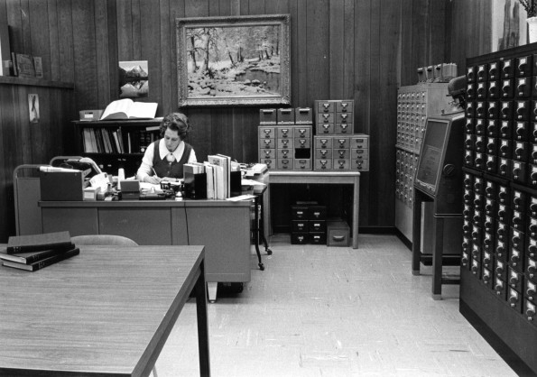 [Louise Dederen working in the Adventist Heritage Room located in the James White Library]