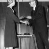 [Marjorie Hamp receives an award for 33 years of service to from Andrews University]