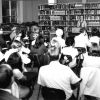 [Library staff meeting led by Mary Jane Mitchell in the James White Library]