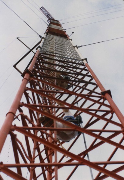 [Keith Ratliff and Mike Lorey climbing tower #3 at Adventist World Radio-Asia in Guam]