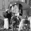 [Student portesters vandalize a sculpture in front of the administration building at Andrews University]