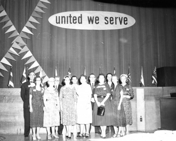 Group photograph of some of the attendees of the Andrews University alumni Homecoming weekend of 1960