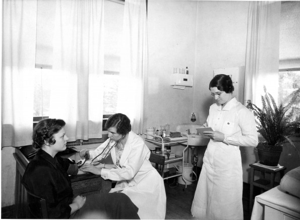 [Nurses taking vitals at Emmanuel Missionary College Medical Clinic]