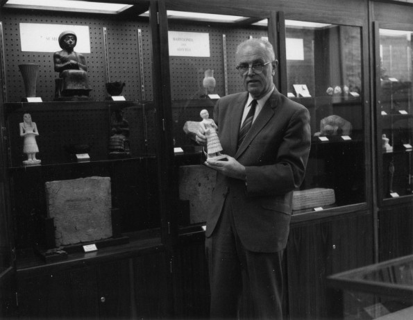 [Siegfried H. Horn showing an artifact in the Andrews University Archaeological Museum]